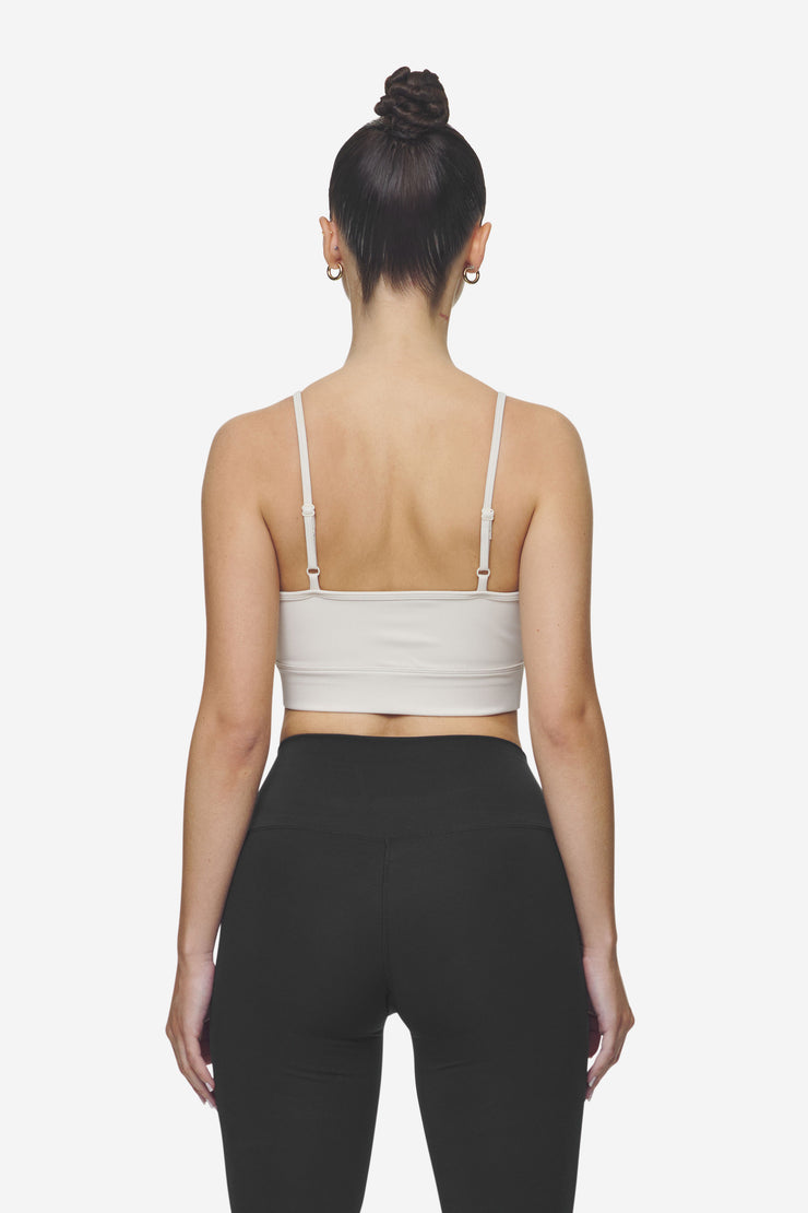 Pegador Taja Sport Bra Coast Sand White Rabatt